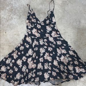 Black polka dot and floral mini dress